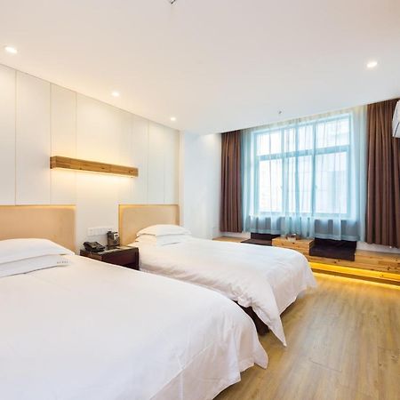 Omeiga Business Hotel Yiwu (Zhejiang) Exterior photo