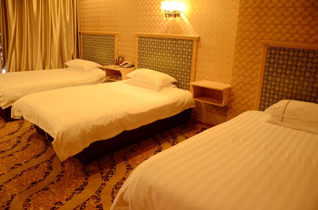 Omeiga Business Hotel Yiwu (Zhejiang) Room photo