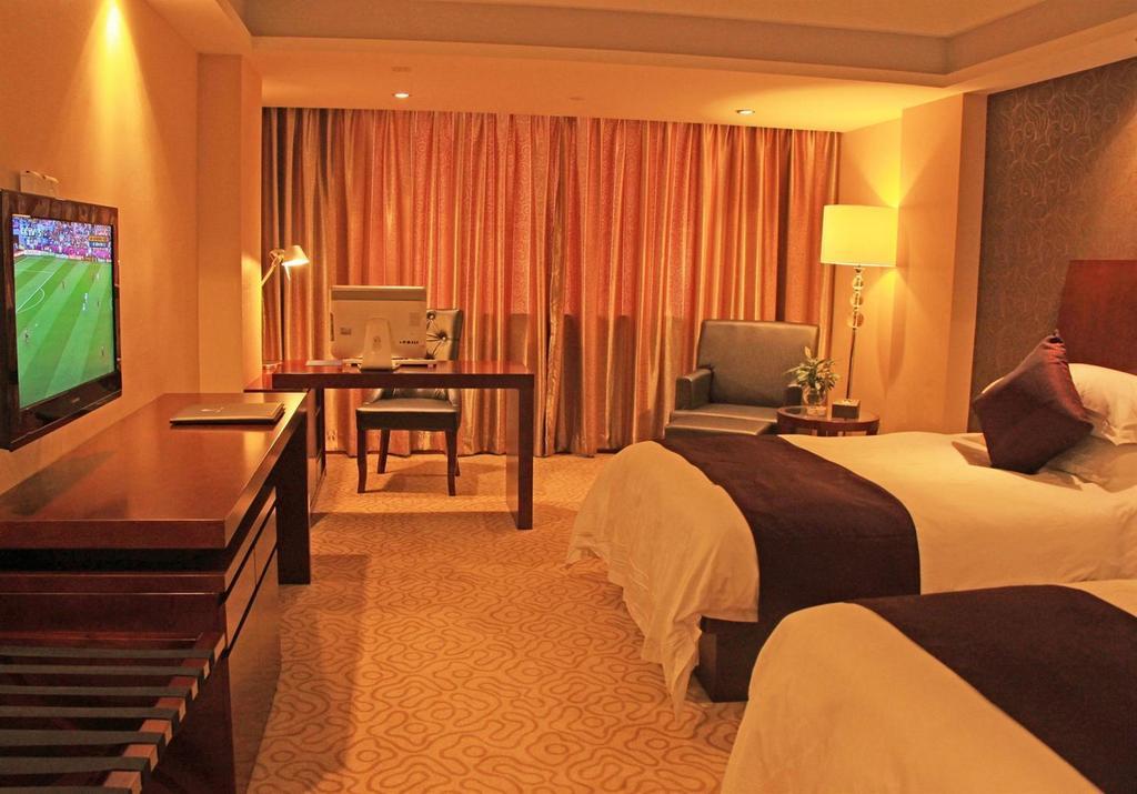 Omeiga Business Hotel Yiwu (Zhejiang) Room photo