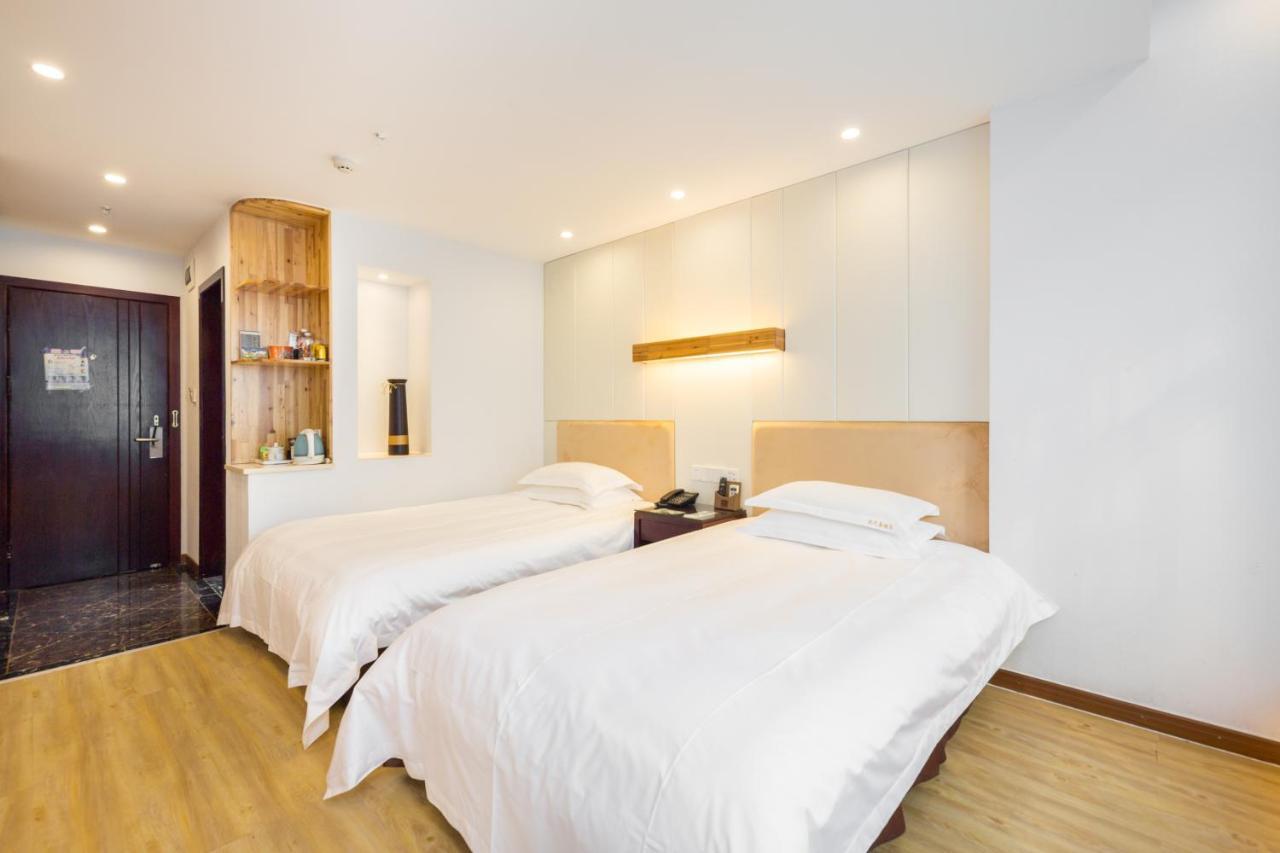 Omeiga Business Hotel Yiwu (Zhejiang) Exterior photo